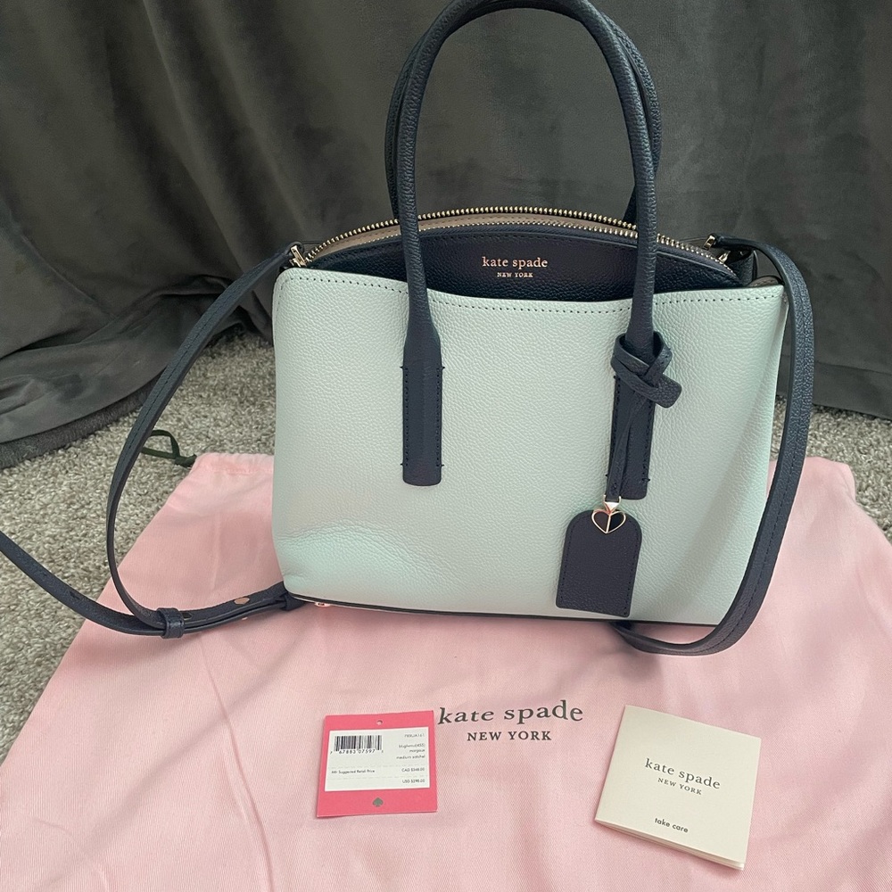 Never used, tag removed but still with bag! Medium Margaux Dome Crossbody.